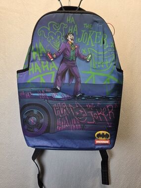 Sprayground DC Joker No Rules Backpack featuring a vibrant, graffiti-styled Bag